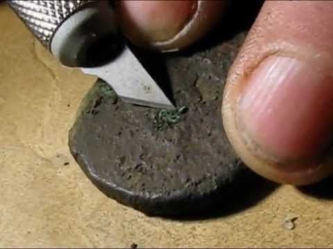 Nettoyage de monnaies romaines, vidéo et photos.